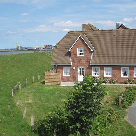 Direkt Am Deich - Ferienwohnung Oland Im Gaestehaus Am Badedeich Dagebull Bagian luar foto
